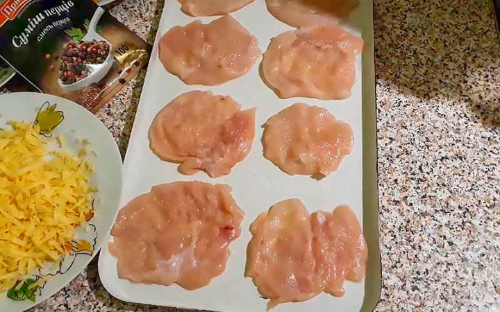 Курка по-французьки з сиром овочами та помідорами