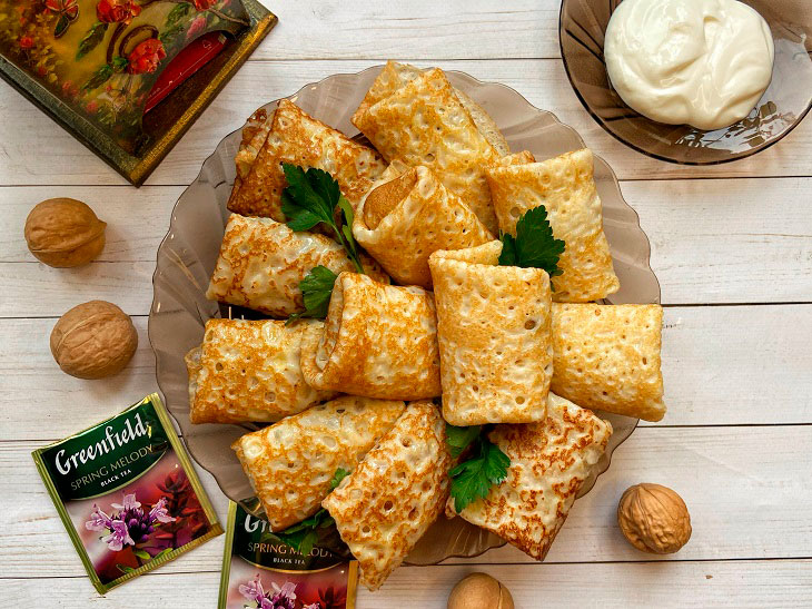 Млинці з м'ясом - простий і ситний рецепт